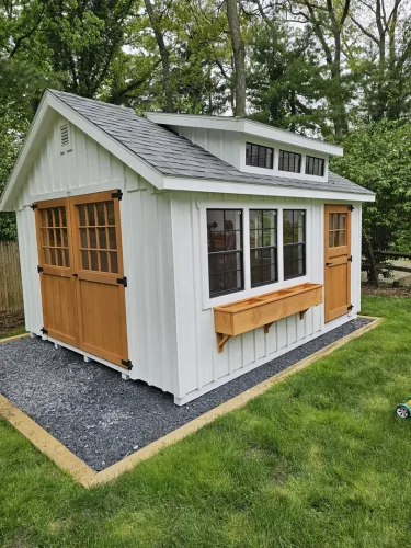 LISB-5.17.24-gardens-hed-board-and-batten-dormer-12-lite-wood-doors